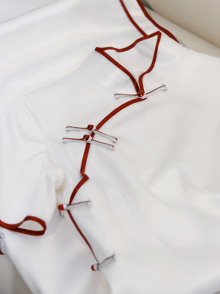 White Silk Qipao with Red Piping and Frog Buttons 素雪紅邊真絲盤扣旗袍